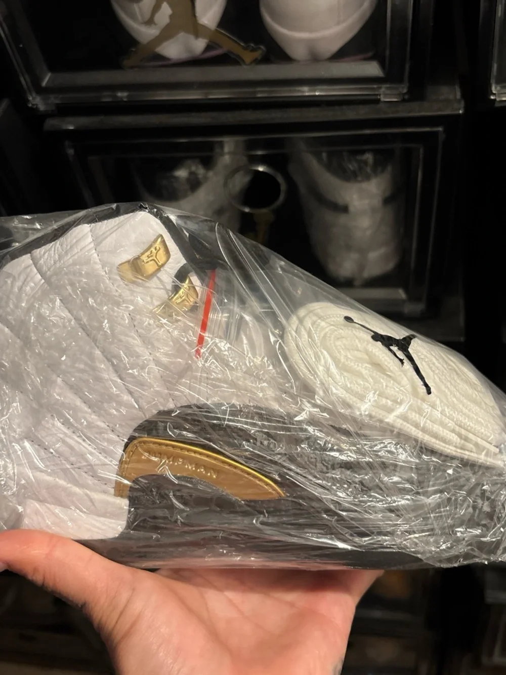 Jordan White and Gold High-Top Sneaker